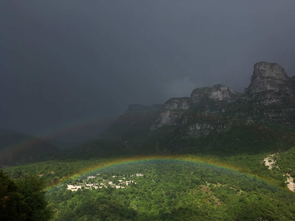 Double rainbow over Mikro Papigo, Zagori, Greece